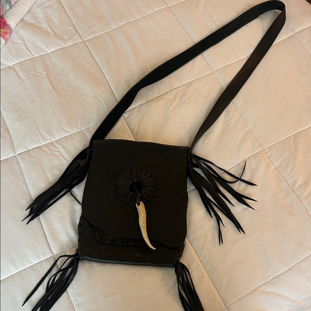 Elegant Black Crossbody Bag with Fringe